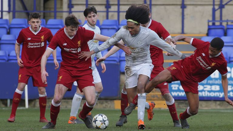 Ben Woodburn inspires Reds in UEFA Youth League 11 Man Utd midfielder Tahith Chong surrounded by Liverpool players