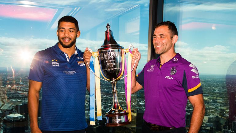 Kallum Watkins of Leeds Rhinos and Cameron Smith of Melbourne Storm hold aloft the World Club Challenge trophy