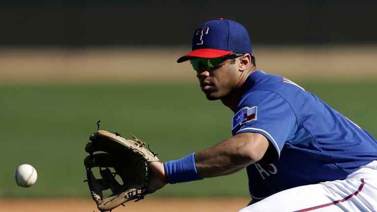 Wilson's baseball rights were owned by the Texas Rangers