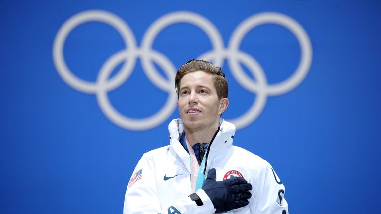 White poses during the medal ceremony for the Snowboard Men's Halfpipe