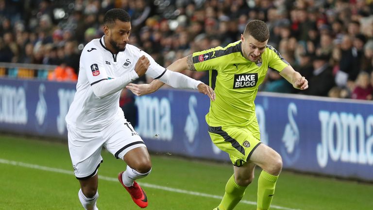 Swansea's Luciano Narsingh is challenged by Notts County's Carl Dickinson