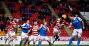 McMann own goal hands Saints win