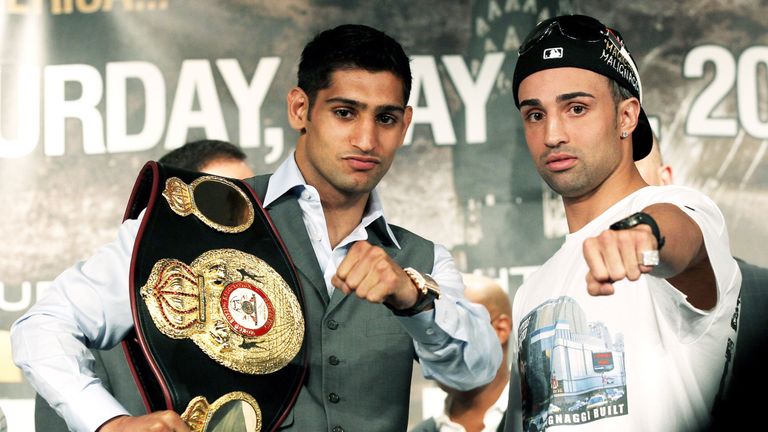 Amir Khan defended his WBA belt against Paulie 'Magic Man' Malignaggi