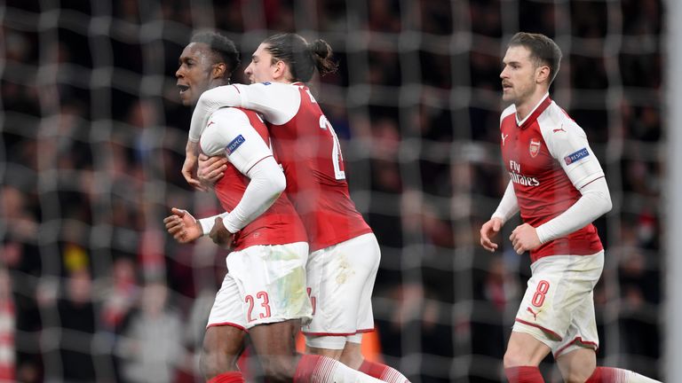 Danny Welbeck celebrates after pulling Arsenal level from the penalty spot