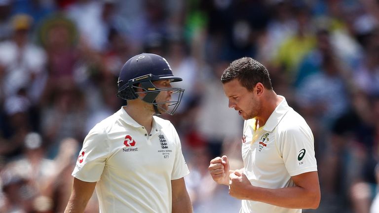 Malan, left, is dismissed by Josh Hazlewood in the Ashes