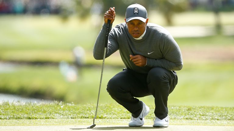 Woods mixed five birdies with four bogeys in his 70