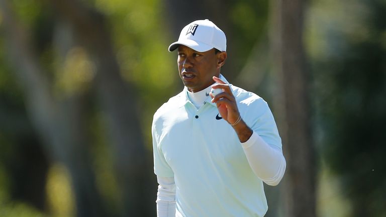 Tiger Woods led outright until making his only bogey of the day at his last hole