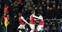 Edgy Arsenal reach Europa League semis
