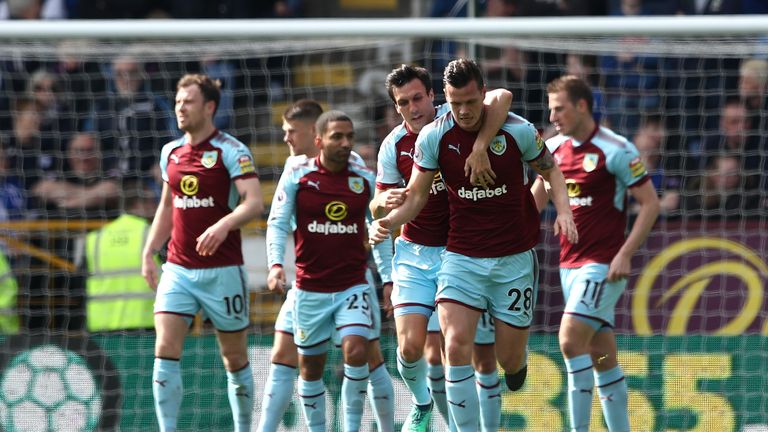 Kevin Long celebrates with teammate Jack Cork after doubling Burnley's lead at Turf Moor