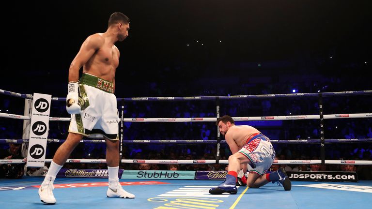 Khan dropped Lo Greco with a powerful right hand