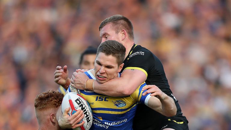 Leeds' Matt Parcell and Warrington Wolves' Harvey Livett collide