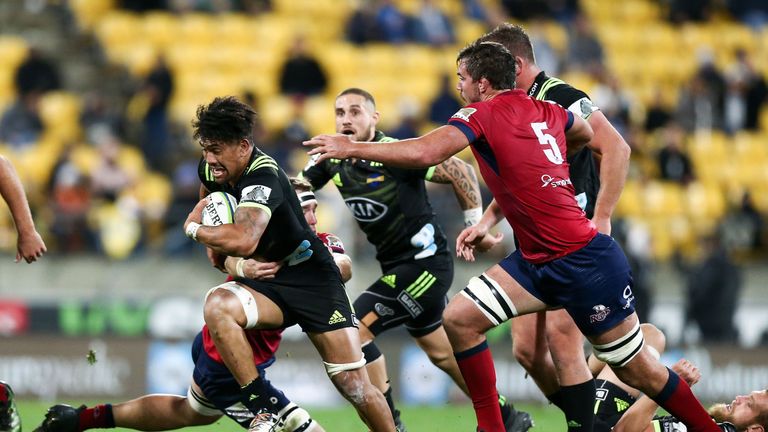 Ardie Savea breaks for the Hurricanes against the Reds