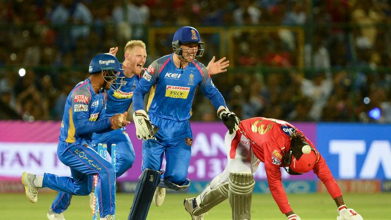 Jos Buttler and Ben Stokes of celebrate the wicket of Kings XI's Chris Gayle (Credit: AFP)