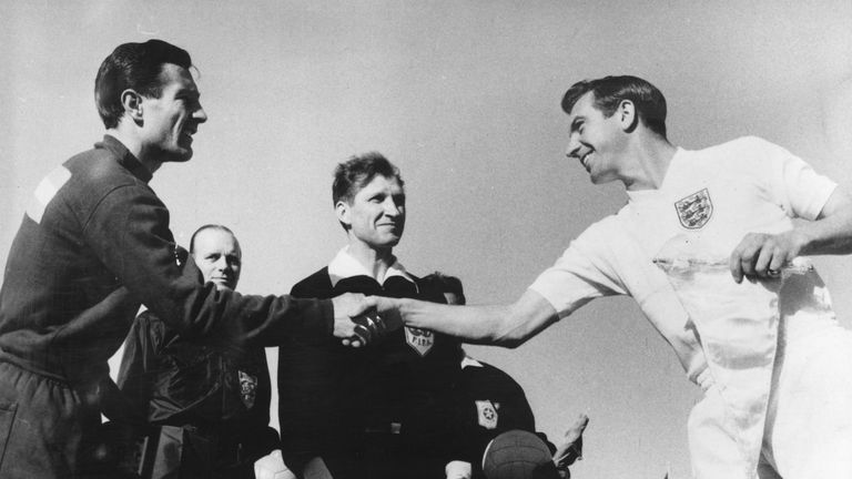 England captain Johnny Haynes shakes hands with Argentina counterpart Ruben Navarro in Rancagua