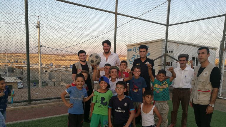 Fisher pictured during his visit to Iraq’s Darashakran refugee camp