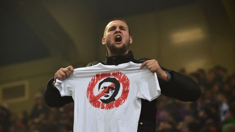 A supporter makes his feelings about Mamic known during a game