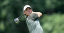 McIlroy charges into contention