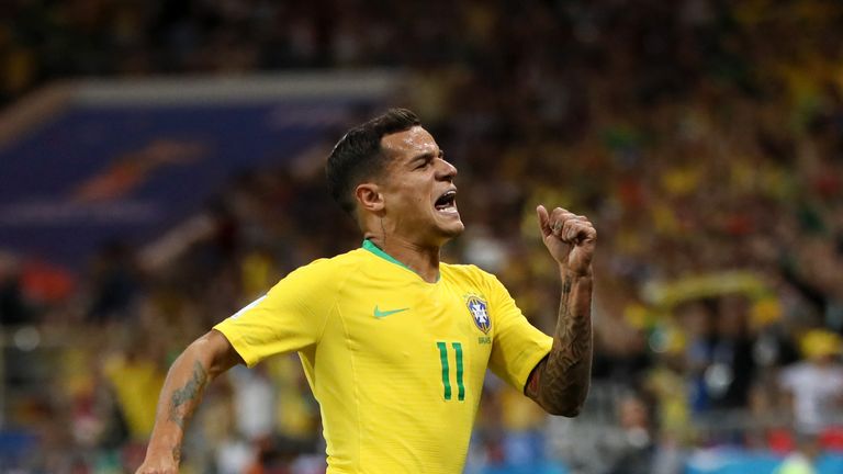 Philippe Coutinho celebrates after giving Brazil the lead against Switzerland