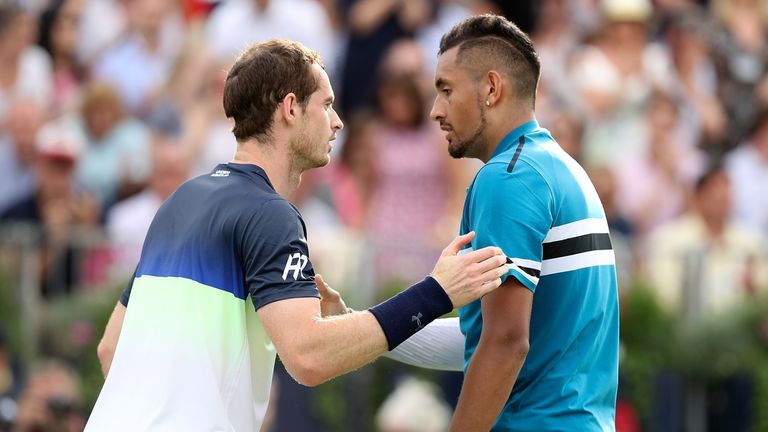 Murray chats to Kyrgios at the net following his defeat