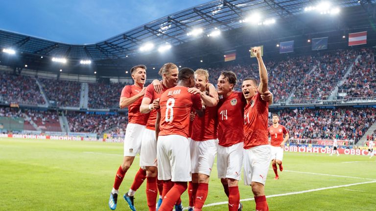 Austria beat Germany on Saturday after a lengthy rain delay