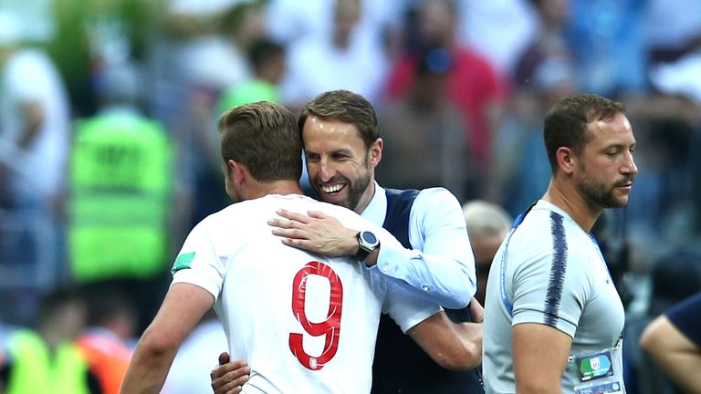 Gareth Southgate embraces Harry Kane as he comes off in the second half