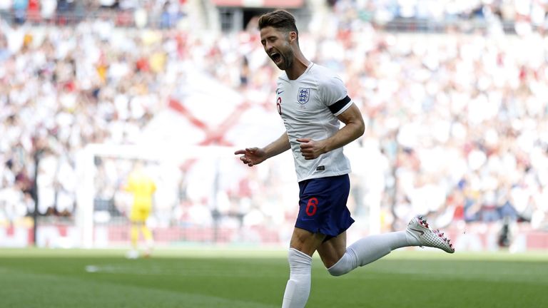 Gary Cahill celebrates after opening the scoring for England