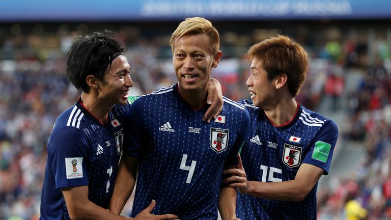 Keisuke Honda scored his fourth goal at a World Cup finals to secure Japan a 2-2 draw with Senegal