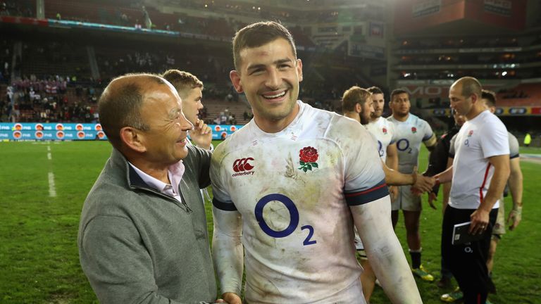 England head coach Eddie Jones congratulates wing Jonny May on another eye-catching display.