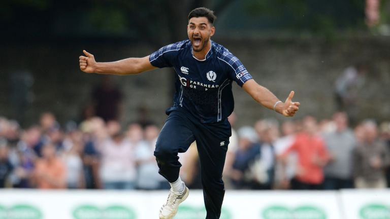 Safyaan Sharif celebrates after taking the final wicket of Mark Wood in Scotland's stunning win