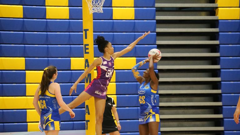 Bath's Kadeen Corbin aims for goal with Shamera Sterling towering above her