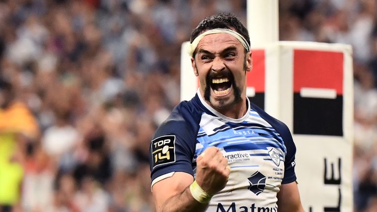 Thomas Combezou celebrates after Steve Mafi's try all but secured the title