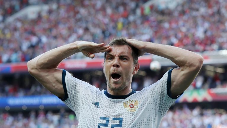 Artem Dzyuba salutes the fans after equalising from the penalty spot
