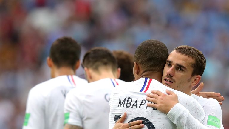   Antione Griezmann celebrates his goal with the team Kylian Mbappe 