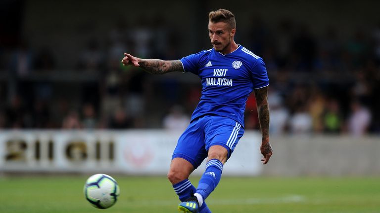 Joe Bennett dons Cardiff's new home kit against Torquay in pre-season