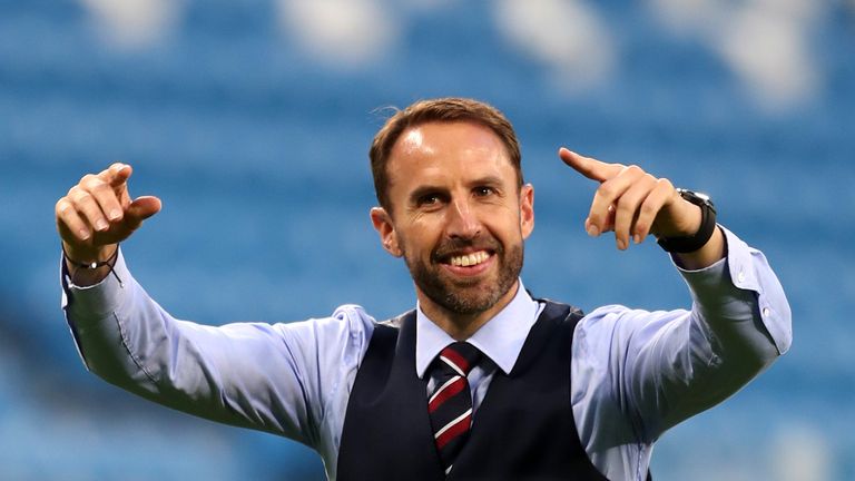   England's Gareth Southgate is in action 