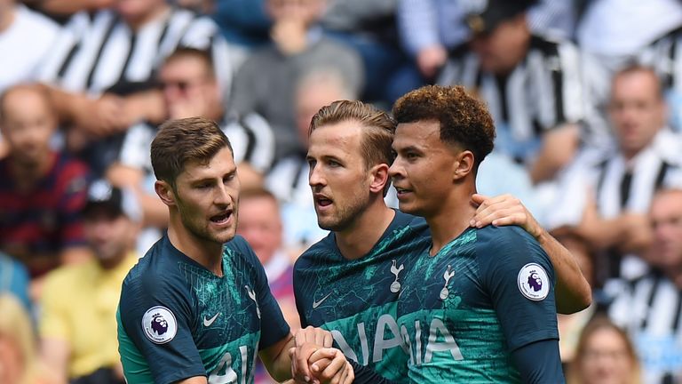 Alli celebrates with team-mates after giving Tottenham a 2-1 lead