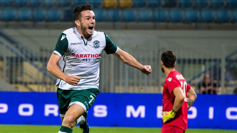 John McGinn wheels away after firing Hibs into the lead against Asteras Tripolis