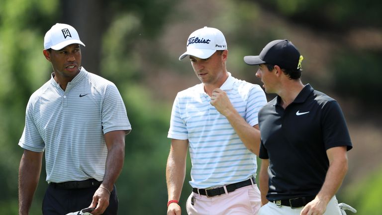 Woods, Thomas and McIlroy still have 11 holes to complete