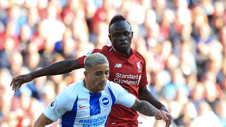   Sadio Mane puts pressure on Anthony Knockaert at Anfield 