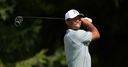 Woods and McIlroy share lead