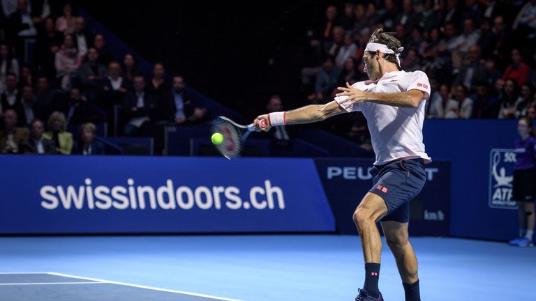 Federer powers on in Basel