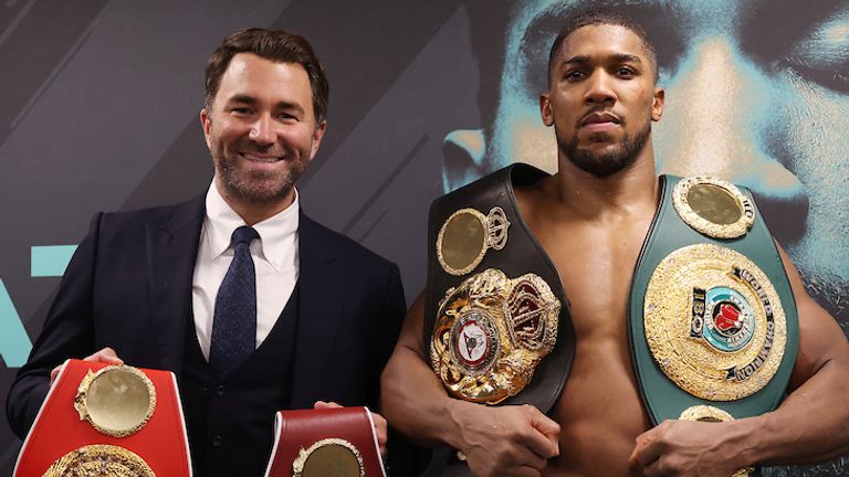 HANDOUT PICTURE COMPLIMENTS OF MATCHROOM BOXING.Anthony Joshua vs Kubrat Pulev, IBF, WBA, WBO & IBO World Title..13 December 2020.Picture By Mark Robinson.Anthony Joshua celebrates with Eddie Hearn in his dressing room. 