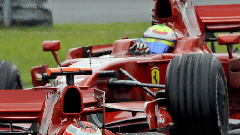 Under fire: Massa tails Raikkonen at Sepang