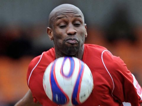 Image of Diallo: Hanging up boots