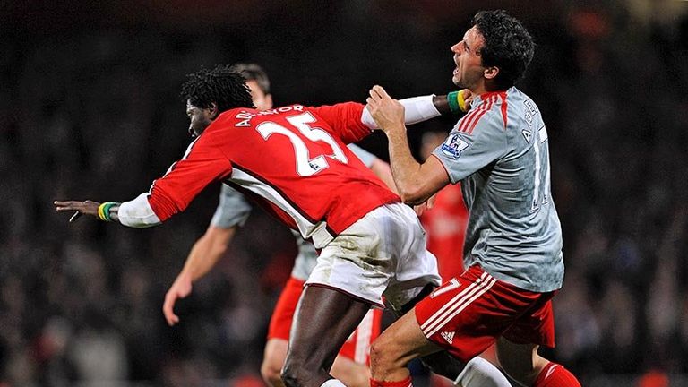 62nd minute: This challenge by Emmanuel Adebayor earns him a second yellow card.