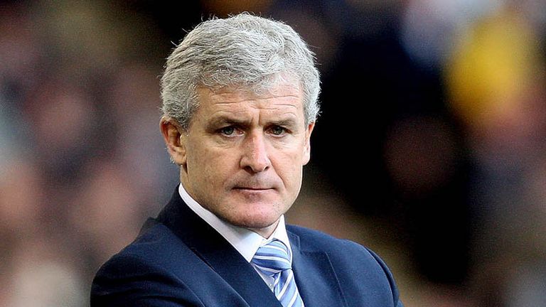 Mark Hughes watches his side take on West Brom.