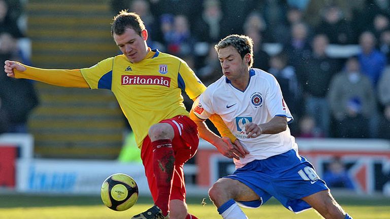 Michael Mackay and Glenn Whelan battle for possession.
