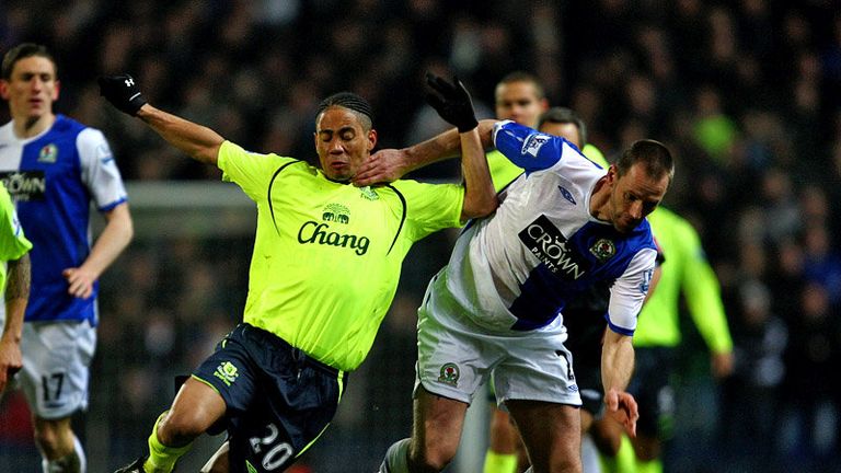 Andre Ooijer battles for possession.