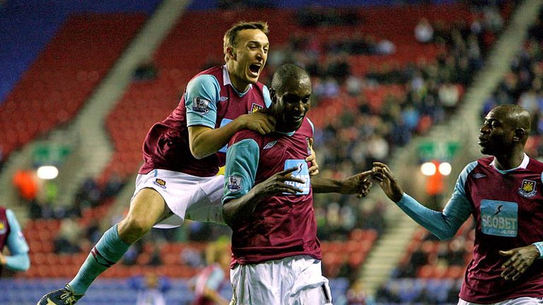Mark Noble celebrates with Carlton Cole as the visitors go in front.