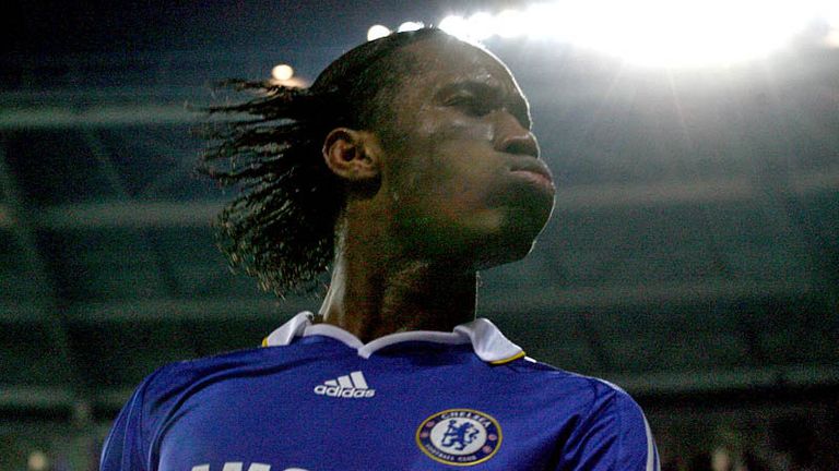 Drogba celebrates securing Chelseas path into the Champions League quarter-finals.